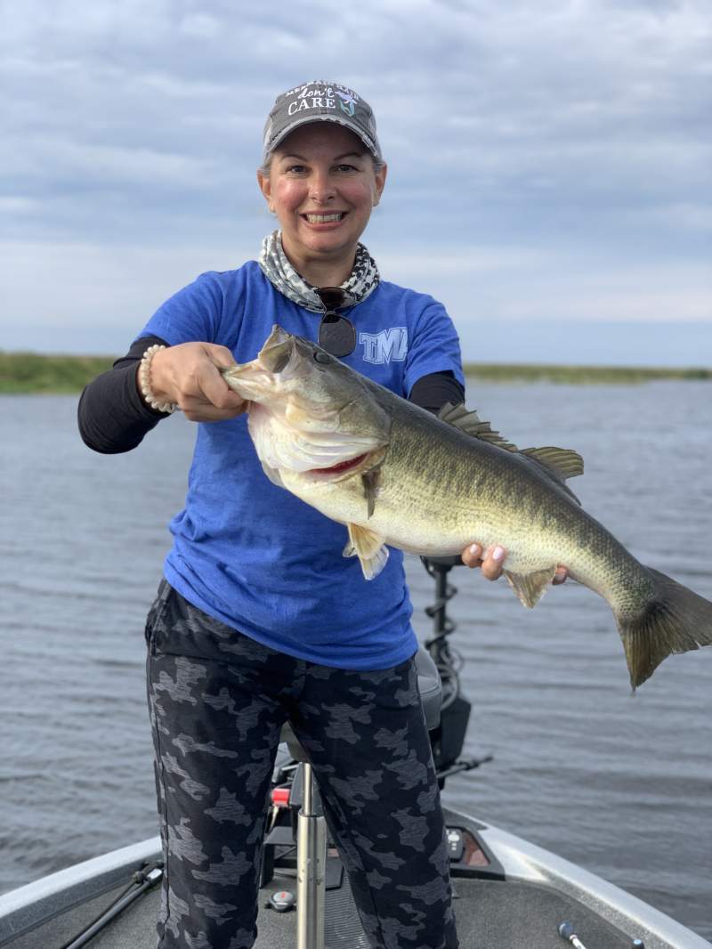 Lady with a large bass
